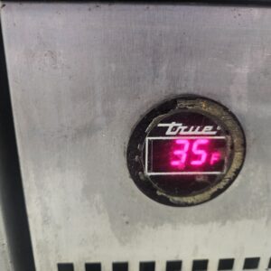 Commercial cooler temperature display showing 35 degrees F